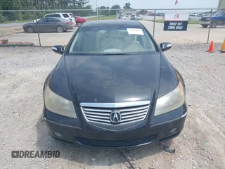 2005 Acura RL z VIN JH4KB16545C018873, wystawiony jako IAAI lot #42423476 z przebiegiem 237 834 mil mil oraz . Historia ofert i sprzedaży dostępna na DreamBid. Obrazek 12.