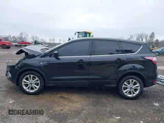 2017 Ford Escape SE with VIN 1FMCU0GD3HUC86839, listed as a IAAI auction lot 42017669 with 106,228 mi miles. Bid and sale history available at carsss.com. Image 15.
