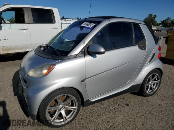 2009 Smart fortwo Passion with VIN WMEEK31X49K302911, listed as a Copart auction lot 63496915 with 44,047 mi miles and Salvage title. Bid and sale history available at DreamBid. Image 1.