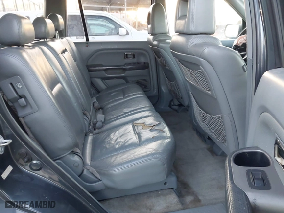 2005 Honda Pilot EX-L with NAVI with VIN 2HKYF187X5H514571, listed as a IAAI auction lot 41746538 with 276,994 mi miles. Bid and sale history available at carsss.com. Image 8.