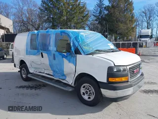 2023 GMC Savana Cargo Van with VIN 1GTW7AFPXP1182925, listed as a IAAI auction lot 41270635 with 7,446 mi miles. Bid and sale history available at carsss.com. Image 1.