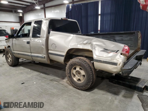 1998 Chevrolet Silverado 1500 with VIN 2GCEK19R9W1105382, listed as a Copart auction lot 87264814 with 290,006 mi miles and Salvage Title. Bid and sale history available at DreamBid. Image 2.