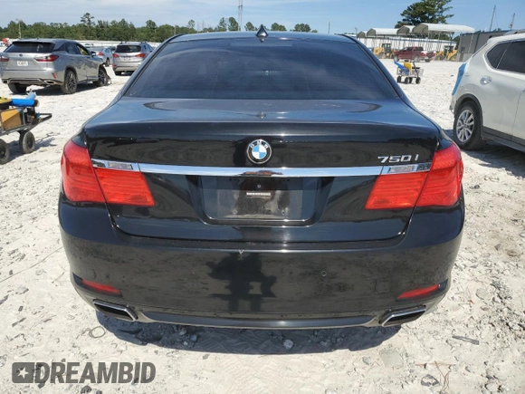 2009 BMW 7 Series 750i with VIN WBAKA83539CY33392, listed as a Copart auction lot 69851964 with 154,888 mi miles and Salvage Title. Bid and sale history available at DreamBid. Image 6.
