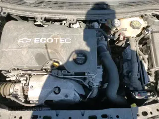 2018 Chevrolet Cruze LT с VIN 3G1BH6SE5JS513695, выставлен на аукционе Copart как лот 49218715 с пробегом 104 572 миль миль и Чистый • Clean title. История ставок и продаж доступна на DreamBid. Изображение 13.