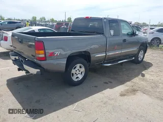 1999 GMC New Sierra 1500 SLE with VIN 2GTEK19T4X1515262, listed as a IAAI auction lot 41985162 with 344,021 mi miles. Bid and sale history available at carsss.com. Image 4.