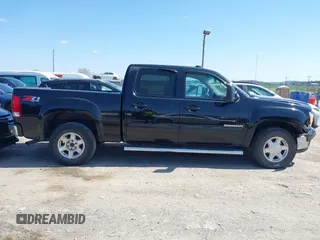 2012 GMC Sierra 1500 SLT with VIN 3GTP2WE70CG134587, listed as a IAAI auction lot 41973632 with 206,378 mi miles and . Bid and sale history available at DreamBid. Image 13.