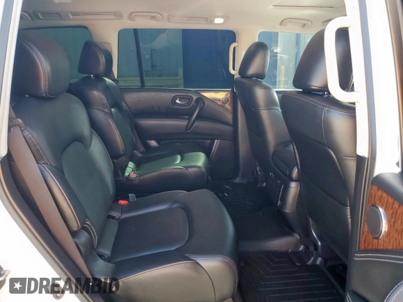2019 Nissan Armada SL z VIN JN8AY2ND4K9085996, wystawiony jako Copart lot #51916125 z przebiegiem 125 050 mil mil oraz Szkoda całkowita • Salvage title. Historia ofert i sprzedaży dostępna na DreamBid. Obrazek 11.