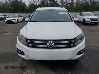 2013 Volkswagen Tiguan SE with VIN WVGAV3AX1DW574009, listed as a Copart auction lot 60936735 with 121,624 mi miles and Clean title. Bid and sale history available at DreamBid. Image 5.