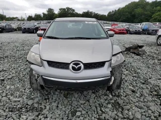 2010 Mazda CX-7 SV z VIN JM3ER2W53A0301123, wystawiony jako Copart lot #58711605 z przebiegiem 236 428 mil mil oraz Szkoda całkowita • Salvage title. Historia ofert i sprzedaży dostępna na DreamBid. Obrazek 5.