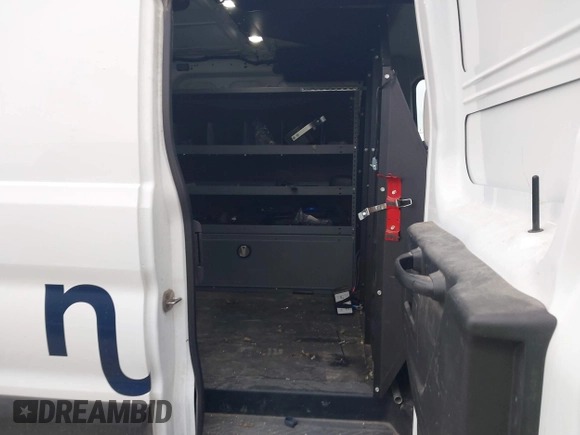 2019 Ford Transit with VIN 1FTYE1ZM2KKB46391, listed as a IAAI auction lot 41362328 with 128,327 mi miles and . Bid and sale history available at carsss.com. Image 8.