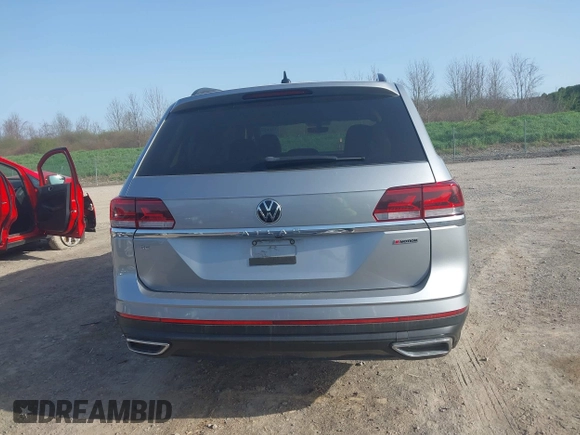 2021 Volkswagen Atlas SE z VIN 1V2LP2CA1MC538847, wystawiony jako IAAI lot #42134093 z przebiegiem 66 678 mil mil oraz . Historia ofert i sprzedaży dostępna na DreamBid. Obrazek 16.