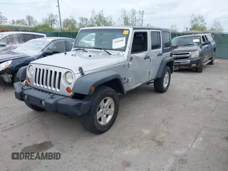 2008 Jeep Wrangler Unlimited X with VIN 1J4GA39108L510829, listed as a IAAI auction lot 42069589 with 108,696 mi miles and . Bid and sale history available at DreamBid. Image 18.