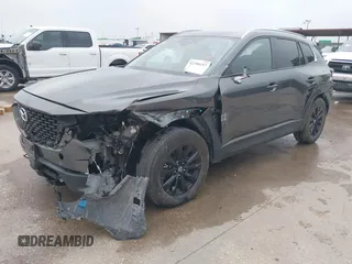 2024 Mazda CX-50 S Select with VIN 7MMVABAM2RN207361, listed as a IAAI auction lot 42290257 with 41,190 mi miles and . Bid and sale history available at DreamBid. Image 2.
