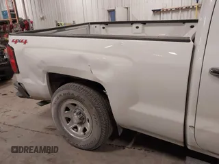 2014 Chevrolet Silverado 1500 Work Truck with VIN 1GCVKPEH5EZ249288, listed as a IAAI auction lot 41479579 with 141,549 mi miles and . Bid and sale history available at DreamBid. Image 17.