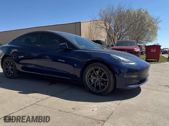 2023 Tesla Model 3 Long Range with VIN 5YJ3E1EB1PF625677, listed as a Copart auction lot 52424245 with 12,817 mi miles and Salvage Title. Bid and sale history available at DreamBid. Image 1.