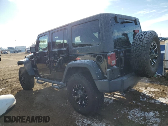 2012 Jeep Wrangler Unlimited Rubicon with VIN 1C4HJWFG2CL260944, listed as a Copart auction lot 43463685 with 151,979 mi miles and Salvage title. Bid and sale history available at DreamBid. Image 2.
