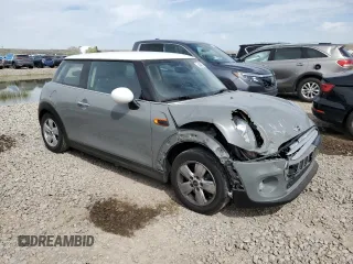 2015 MINI Hardtop with VIN WMWXM5C53FT941132, listed as a Copart auction lot 54340195 with 127,520 mi miles and Salvage title. Bid and sale history available at DreamBid. Image 4.