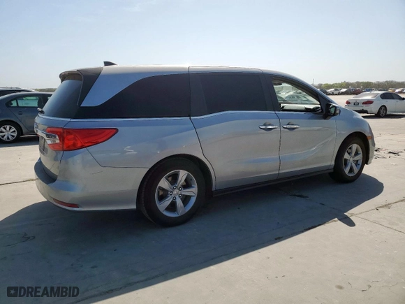 2018 Honda Odyssey EX-L with VIN 5FNRL6H7XJB052502, listed as a Copart auction lot 50344635 with 101,217 mi miles and Salvage Title. Bid and sale history available at carsss.com. Image 3.