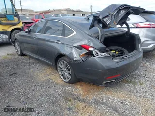 2018 Genesis G80 3.8L with VIN KMHGN4JE7JU262623, listed as a IAAI auction lot 41230215 with 94,006 mi miles. Bid and sale history available at carsss.com. Image 3.