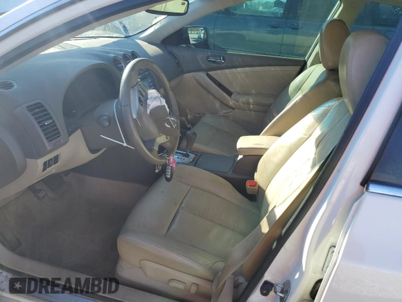 2012 Nissan Altima S with VIN 1N4AL2AP4CC166128, listed as a Copart auction lot 87224004 with 217,007 mi miles and Salvage Title. Bid and sale history available at DreamBid. Image 7.