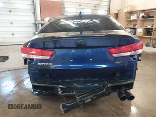 2016 Kia Optima LX with VIN 5XXGT4L33GG026572, listed as a IAAI auction lot 41514872 with 135,423 mi miles. Bid and sale history available at carsss.com. Image 16.