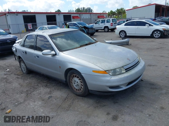 2002 Saturn LS z VIN 1G8JS54F92Y595651, wystawiony jako IAAI lot #41569902 z przebiegiem Nie podano mil oraz . Historia ofert i sprzedaży dostępna na DreamBid. Obrazek 1.