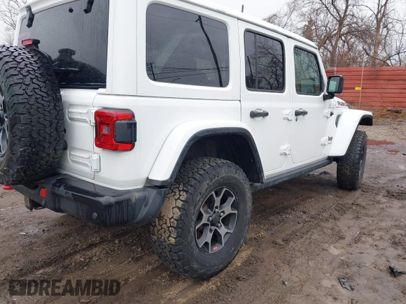 2018 Jeep Wrangler Unlimited Rubicon with VIN 1C4HJXFG6JW301254, listed as a IAAI auction lot 41654089 with 71,364 mi miles and . Bid and sale history available at DreamBid. Image 4.