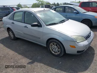 2007 Ford Focus S z VIN 1FAFP34N67W338545, wystawiony jako IAAI lot #42111366 z przebiegiem 370 000 mil mil oraz . Historia ofert i sprzedaży dostępna na DreamBid. Obrazek 1.