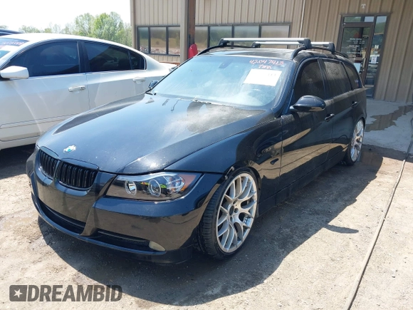 2007 BMW 3 Series 328i with VIN WBAVS13527FX15900, listed as a IAAI auction lot 42047413 with 159,249 mi miles. Bid and sale history available at carsss.com. Image 2.