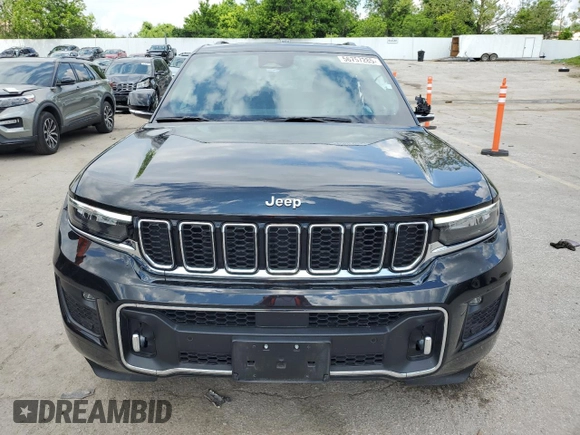 2023 Jeep Grand Cherokee Overland with VIN 1C4RJHDG0PC670537, listed as a Copart auction lot 56757285 with 24,735 mi miles and Salvage title. Bid and sale history available at DreamBid. Image 5.
