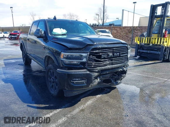 2022 Ram 2500 Laramie z VIN 3C6UR5FL2NG377414, wystawiony jako IAAI lot #41492443 z przebiegiem 100 477 mil mil oraz . Historia ofert i sprzedaży dostępna na DreamBid. Obrazek 1.