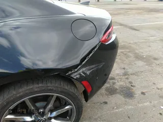 2021 Mazda MX-5 Miata Grand Touring z VIN JM1NDAM75M0451597, wystawiony jako IAAI lot #41932712 z przebiegiem 61 710 mil mil oraz . Historia ofert i sprzedaży dostępna na DreamBid. Obrazek 19.