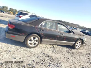 2002 Mazda Millenia z VIN JM1TA221021729625, wystawiony jako Copart lot #87304234 z przebiegiem 88 376 mil mil oraz Szkody całkowita. Historia ofert i sprzedaży dostępna na DreamBid. Obrazek 3.