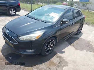 2015 Ford Focus SE with VIN 1FADP3F21FL280550, listed as a IAAI auction lot 42200104 with 146,175 mi miles and . Bid and sale history available at DreamBid. Image 2.
