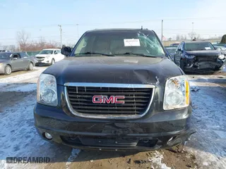 2013 GMC Yukon XL SLT with VIN 1GKS1KE06DR235597, listed as a IAAI auction lot 41315573 with 277,634 mi miles. Bid and sale history available at carsss.com. Image 6.