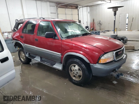 1999 GMC Jimmy SLE with VIN 1GKDT13W3X2535602, listed as a Copart auction lot 83250924 with 203,134 mi miles and Salvage Title. Bid and sale history available at carsss.com. Image 4.