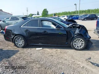 2010 Cadillac CTS with VIN 1G6DA5EG7A0140388, listed as a IAAI auction lot 42451088 with 123,128 mi miles and . Bid and sale history available at DreamBid. Image 13.