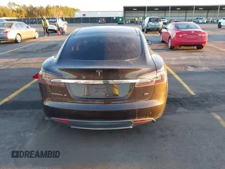2013 Tesla Model S with VIN 5YJSA1CN7DFP22690, listed as a IAAI auction lot 40981089 with 188,057 mi miles. Bid and sale history available at carsss.com. Image 17.
