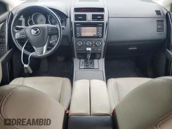 2014 Mazda CX-9 Touring with VIN JM3TB3CVXE0443089, listed as a Copart auction lot 64545195 with 121,229 mi miles and Clean title. Bid and sale history available at DreamBid. Image 8.