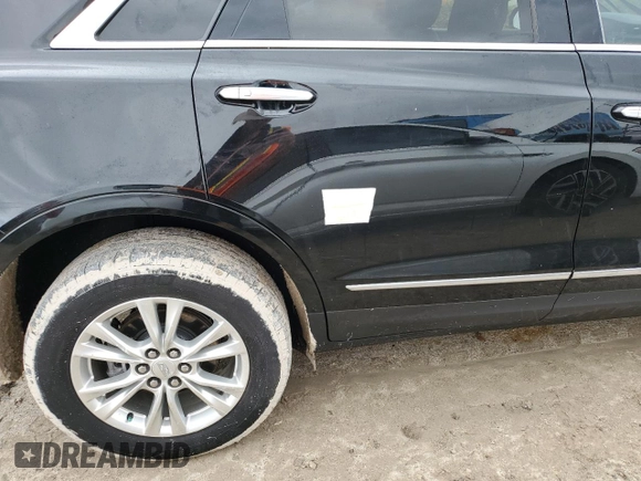 2022 Cadillac XT5 FWD Luxury z VIN 1GYKNAR4XNZ165234, wystawiony jako Copart lot #85392754 z przebiegiem 36 100 mil mil oraz Nie do naprawy • Non repairable. Historia ofert i sprzedaży dostępna na DreamBid. Obrazek 13.