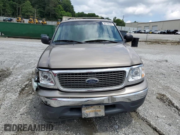 2001 Ford Expedition XLT with VIN 1FMRU15W41LA73480, listed as a Copart auction lot 56740535 with 258,678 mi miles and Salvage title. Bid and sale history available at DreamBid. Image 5.