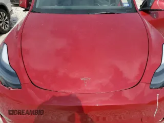 2021 Tesla Model Y Standard Range with VIN 5YJYGDED5MF116562, listed as a Copart auction lot 51211535 with 68,549 mi miles and Salvage Title. Bid and sale history available at DreamBid. Image 12.