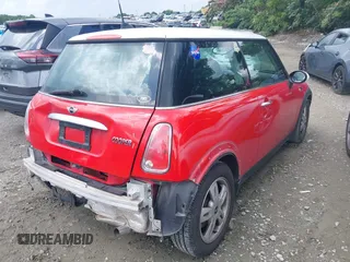 2006 MINI Hardtop with VIN WMWRC33596TK67276, listed as a IAAI auction lot 42488546 with 41,229 mi miles and . Bid and sale history available at DreamBid. Image 4.