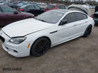 2014 BMW 6 Series 650i with VIN WBA6B2C55ED129596, listed as a IAAI auction lot 41927727 with 999,999 mi miles. Bid and sale history available at carsss.com. Image 2.