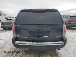 2010 GMC Yukon XL z VIN 1GKUCMEF0AR249218, wystawiony jako Copart lot #88347805 z przebiegiem Nie podano mil oraz Szkoda całkowita • Salvage title. Historia ofert i sprzedaży dostępna na DreamBid. Obrazek 6.