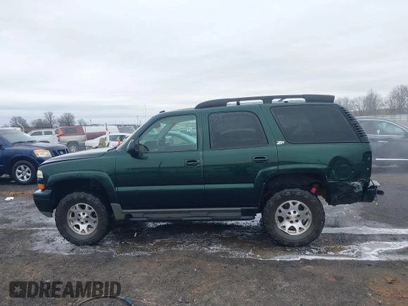 2004 Chevrolet Tahoe Z71 z VIN 1GNEK13Z84R118371, wystawiony jako IAAI lot #41535389 z przebiegiem 255 815 mil mil oraz . Historia ofert i sprzedaży dostępna na DreamBid. Obrazek 14.