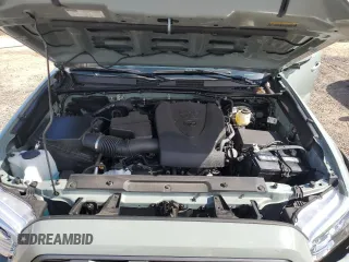 2023 Toyota Tacoma SR z VIN 3TYCZ5AN0PT156688, wystawiony jako Copart lot #51185145 z przebiegiem 4 868 mil mil oraz Szkoda całkowita • Salvage title. Historia ofert i sprzedaży dostępna na DreamBid. Obrazek 11.