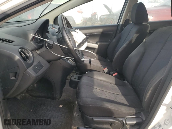 2012 Mazda 2 Sport with VIN JM1DE1KY8C0145089, listed as a Copart auction lot 52093925 with 211,282 mi miles and Salvage Title. Bid and sale history available at DreamBid. Image 7.