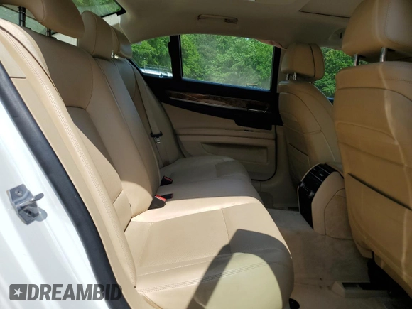 2014 BMW 7 Series 740i z VIN WBAYA6C51ED144132, wystawiony jako Copart lot #55131365 z przebiegiem 116 826 mil mil oraz Szkoda całkowita • Salvage title. Historia ofert i sprzedaży dostępna na DreamBid. Obrazek 10.