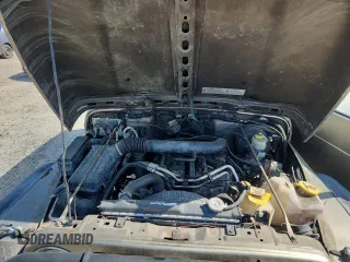 2003 Jeep Wrangler Rubicon with VIN 1J4FA69S13P310131, listed as a Copart auction lot 59139025 with 260,349 mi miles and Salvage title. Bid and sale history available at DreamBid. Image 11.